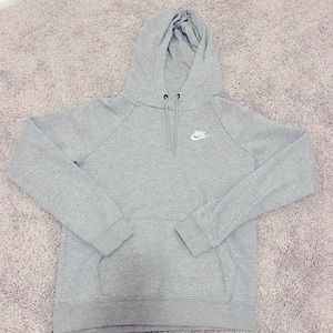 NIKE hoodie, light stains, worn, and has lost the caps on strings but its inside